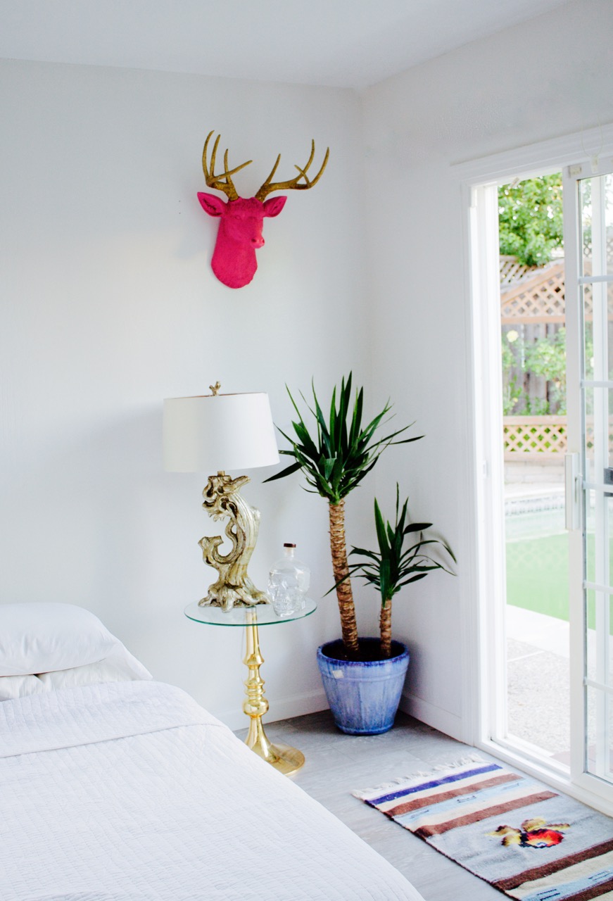hot pink deer head white faux taxidermy yucca tree