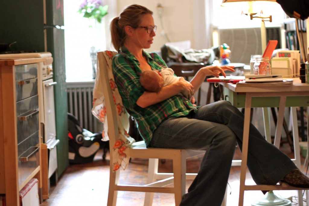 working mother breastfeeding