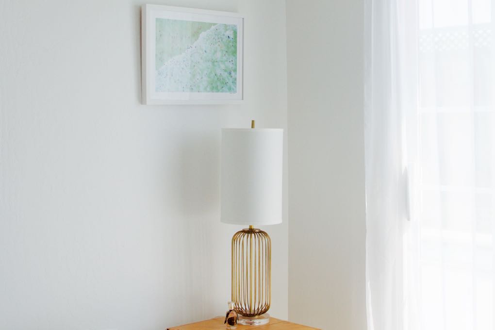 Aerial beach print in a simple white room
